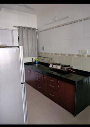 Kitchen in 2 BHK Apartment at Magarpatta City Iris, Hadapsar – for Sale