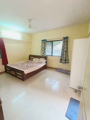 Living Room in 2 BHK Apartment at Magarpatta City Iris, Hadapsar – for Sale