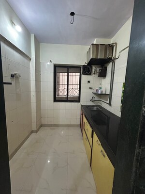 Kitchen in 1 BHK Apartment at Indravati Apartment, Dahisar East – for Sale