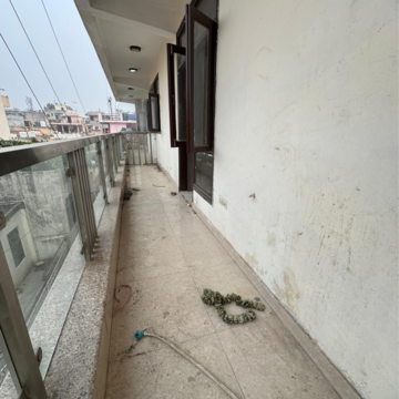 Balcony in 2 BHK Apartment at Palm Residency Chhatarpur, Rajpur Khurd Extension – for Rent