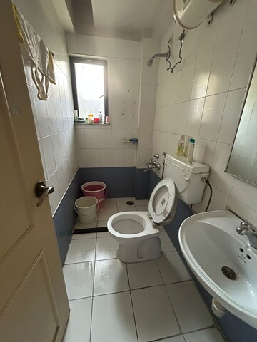 Bathroom in 1 BHK Apartment at Hiranandani Estate Brentford, Ghodbunder Road – for Rent