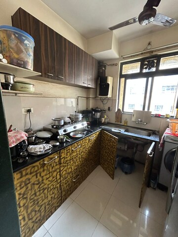 Kitchen in 1 BHK Apartment at Hiranandani Estate Brentford, Ghodbunder Road – for Rent