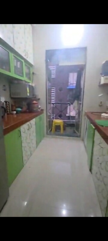 Kitchen in 2 BHK Apartment at Queens Park, Mira Road – for Sale