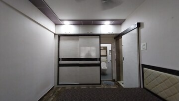 Bedroom in 1 BHK Apartment at Kshitij CHS, Goregaon East – for Rent