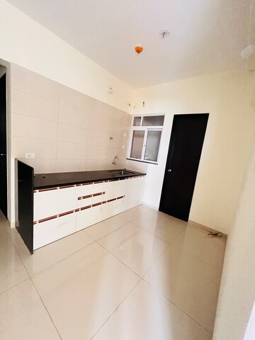 Kitchen in 2.5 BHK Apartment at Kolte Patil Life Republic, Marunji – for Rent