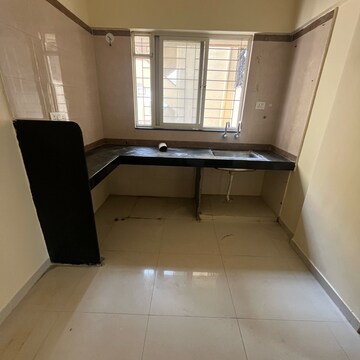 Kitchen in 2 BHK Apartment at Renuka Gulmohar C Building CHS, Pimpri Chinchwad Pcmc – for Rent