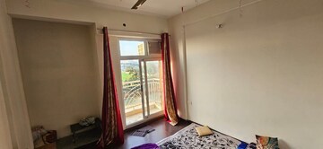 Living Room in 2 BHK Apartment at Supertech Livingston, Sain Vihar – for Rent
