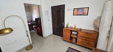 Living Room in 2 BHK Apartment at Supertech Livingston, Sain Vihar – for Rent