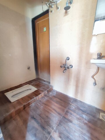 Bathroom in 1 BHK Apartment at Squarefeet Grand Square, Anand Nagar – for Rent