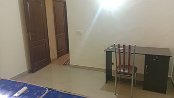 Living Room in 2 BHK Apartment at Aims Golf City, Sector 75 – for Rent