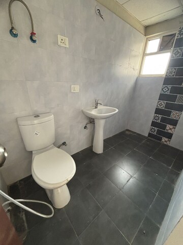 Bathroom in 3 BHK Apartment at Skytech Merion Residency 1, Sain Vihar – for Sale