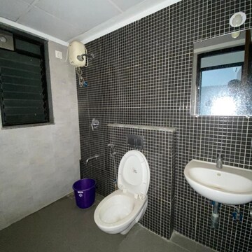 Bathroom in 2 BHK Apartment at Lodha Palava Downtown, Taloja Bypass Road – for Rent