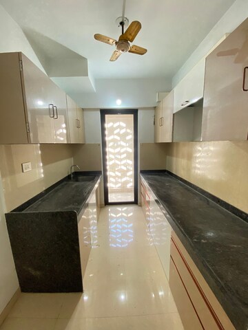 Kitchen in 2 BHK Apartment at Lodha Palava Downtown, Dombivli East – for Rent