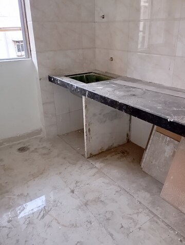 Kitchen in 1 BHK Apartment at Crystal Paradise Residences, Andheri East – for Sale