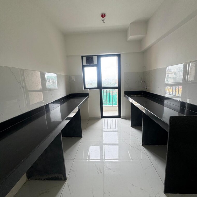 Kitchen, runwal-gardens-phase-2 3 Bedroom 904 Sq.Ft. Apartment In Kalyan Shilphata Road Thane 8993147
