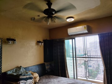 Bedroom in 3 BHK Apartment at Shiv Shakti CHS Andheri, Andheri West – for Sale