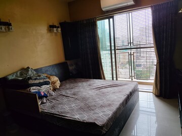 Bedroom in 3 BHK Apartment at Shiv Shakti CHS Andheri, Andheri West – for Sale