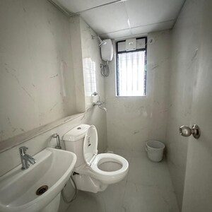 Bathroom in 1 BHK Apartment at Runwal Gardens Phase 2, Kalyan Shilphata Road – for Sale