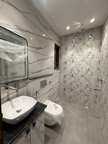 Bathroom in 3 BHK Builder Floor at Paschim Vihar – for Sale