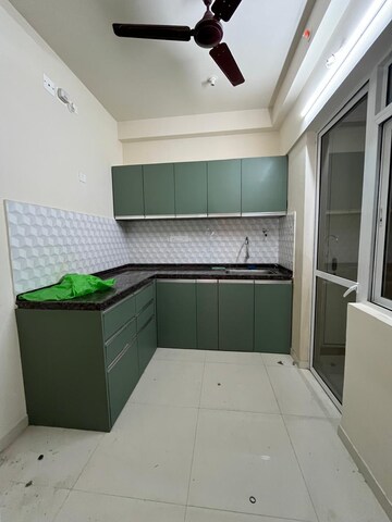 Kitchen in 2 BHK Apartment at Godrej Green Cove, Mahalunge – for Rent