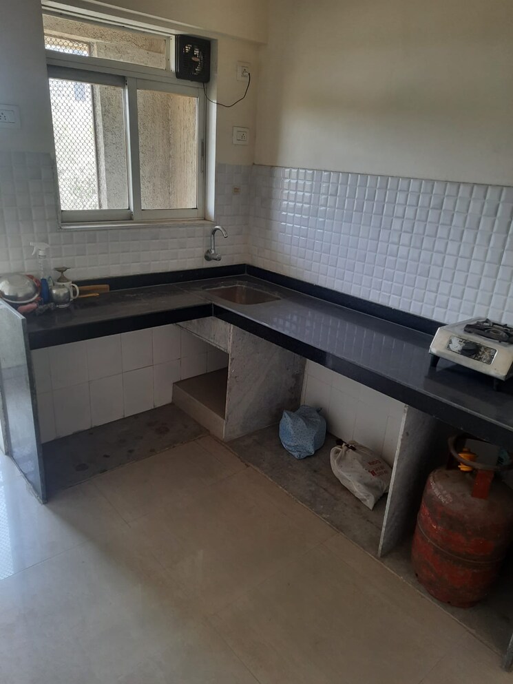 Kitchen, rosa-elite 2 Bedroom 650 Sq.Ft. Apartment In Bhayandarpada Thane 8993388