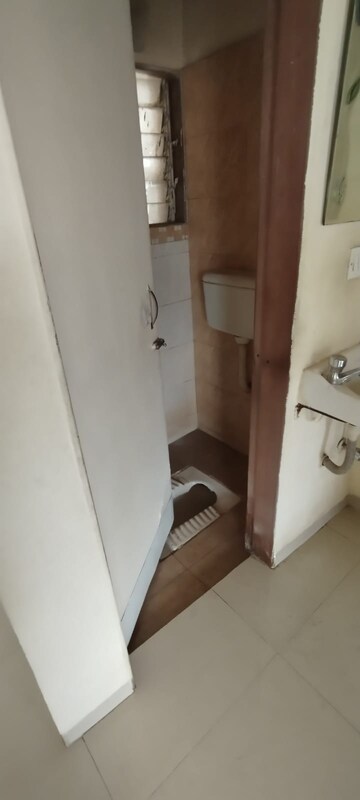 Bathroom in 1 BHK Apartment at Mahalaxmi Tower Kasarvadavali, Kasarvadavali – for Rent