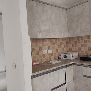 Kitchen in 2 BHK Apartment at Mahagun Mywoods, Sector 16c Greater Noida – for Rent