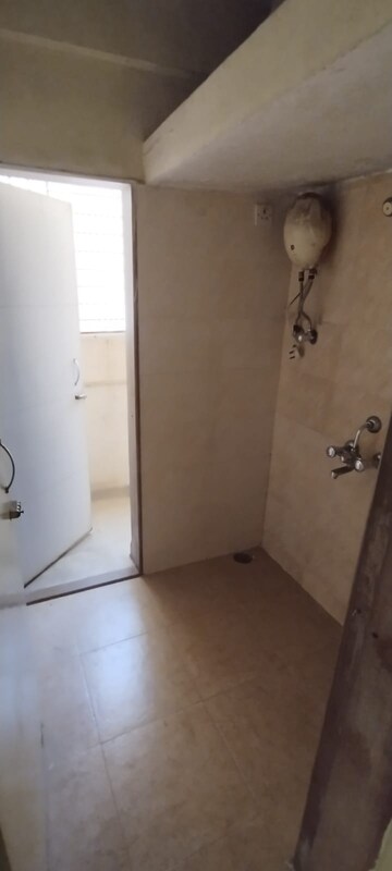 Bathroom in 1 BHK Apartment at Mahalaxmi Tower Kasarvadavali, Kasarvadavali – for Rent