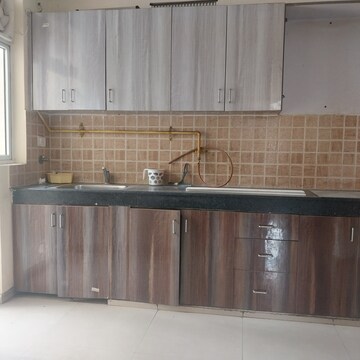 Kitchen in 2.5 BHK Apartment at Mahagun Mywoods II, Sector 16c Greater Noida – for Rent