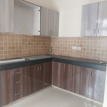 Kitchen in 2.5 BHK Apartment at Mahagun Mywoods II, Sector 16c Greater Noida – for Rent