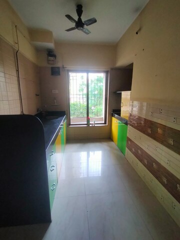 Kitchen in 2 BHK Apartment at Harmony Residency Owale, Owale – for Rent