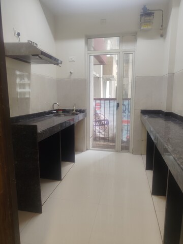 Kitchen in 1.5 BHK Apartment at Marathon Nexzone, New Panvel – for Rent