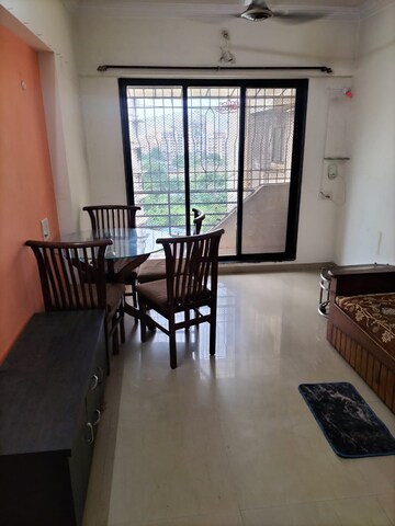 Living Room in 1 BHK Apartment at Raunak Heights, Ghodbunder Road – for Rent