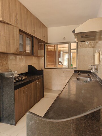 Kitchen in 2 BHK Apartment at Shri Rosewood Park, Wagholi – for Sale
