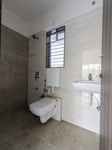 Bathroom in 1 BHK Apartment at Dharti Presidio, Malad West – for Rent