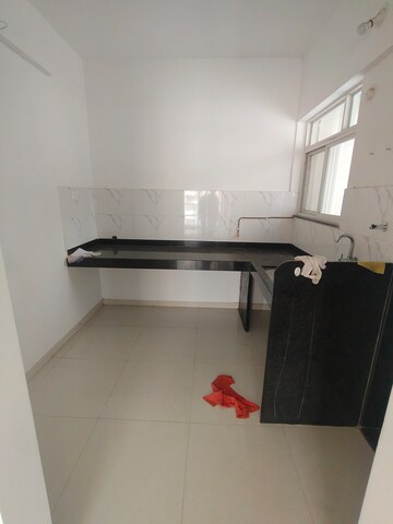Kitchen in 1 BHK Apartment at Dynamic Grandeur, Undri – for Rent