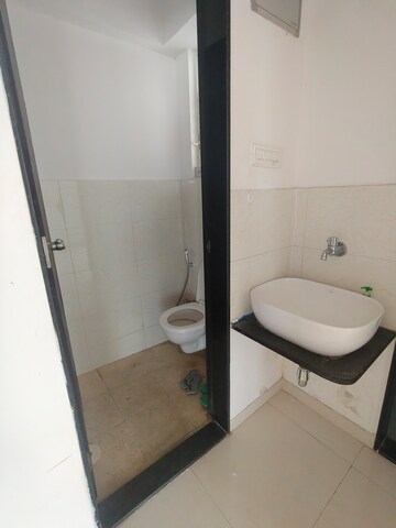 Bathroom in 1 BHK Apartment at Dynamic Grandeur, Undri – for Rent