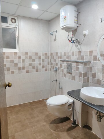 Bathroom in 2 BHK Apartment at Shalimar One World Belvedere Court 3, Gomti Nagar – for Rent