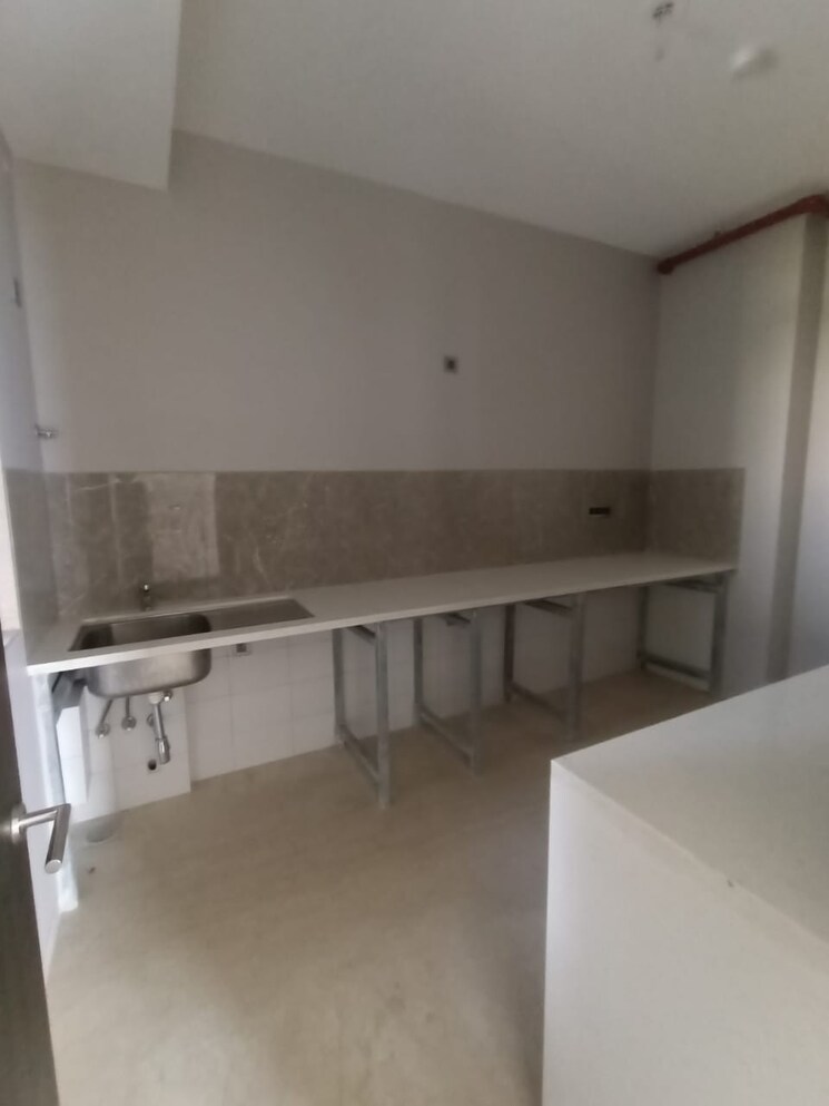 Kitchen, oberoi-realty-enigma-and-eternia 3 Bedroom 1049 Sq.Ft. Apartment In Mulund West Mumbai 8994024