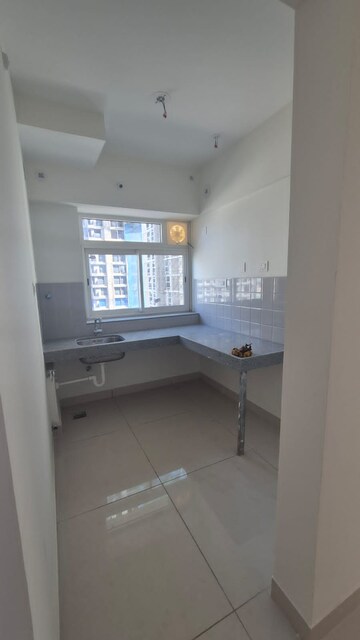 Kitchen in 1 BHK Apartment at Shapoorji Pallonji Siennaa, Kandivali East – for Rent