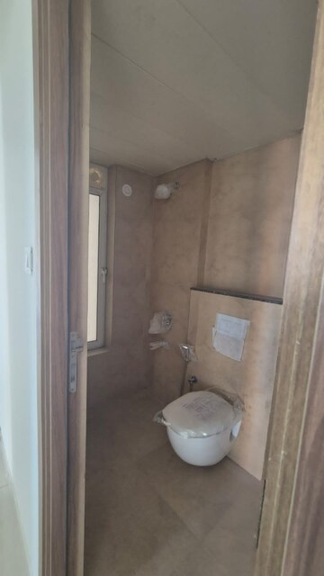 Bathroom in 1 BHK Apartment at Shapoorji Pallonji Siennaa, Kandivali East – for Rent