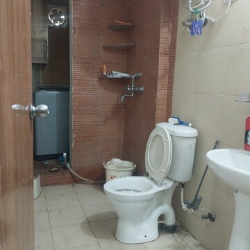 Bathroom in 2.5 BHK Apartment at Mahagun Mywoods, Sector 16c Greater Noida – for Rent