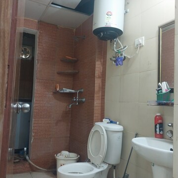 Bathroom in 2.5 BHK Apartment at Mahagun Mywoods, Sector 16c Greater Noida – for Rent