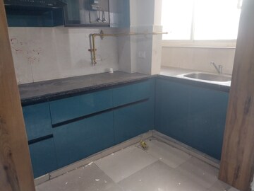 Kitchen in 2.5 BHK Apartment at Mahagun Mywoods II, Sector 16c Greater Noida – for Rent