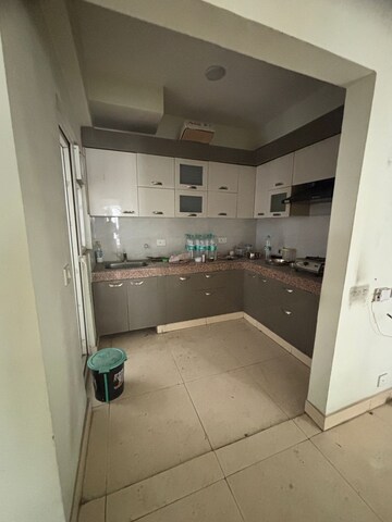 Kitchen in 2 BHK Apartment at Mahagun Mahagunpuram, Shastri Nagar – for Sale