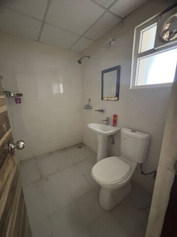 Bathroom in 2 BHK Apartment at Mahagun Mahagunpuram, Shastri Nagar – for Sale