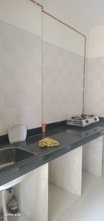 Bathroom in 1 BHK Apartment at Rosa Royale, Ghodbunder Road – for Rent