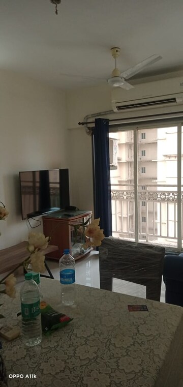 Living Room in 1 BHK Apartment at Rosa Royale, Ghodbunder Road – for Rent