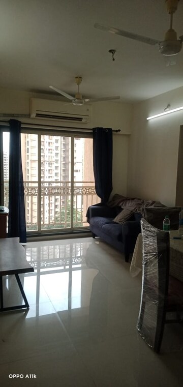 Living Room in 1 BHK Apartment at Rosa Royale, Ghodbunder Road – for Rent