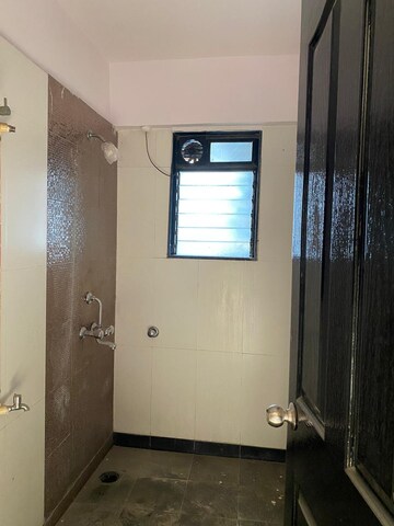 Bathroom in 1 BHK Apartment at Lalani Residency, Kavesar – for Rent